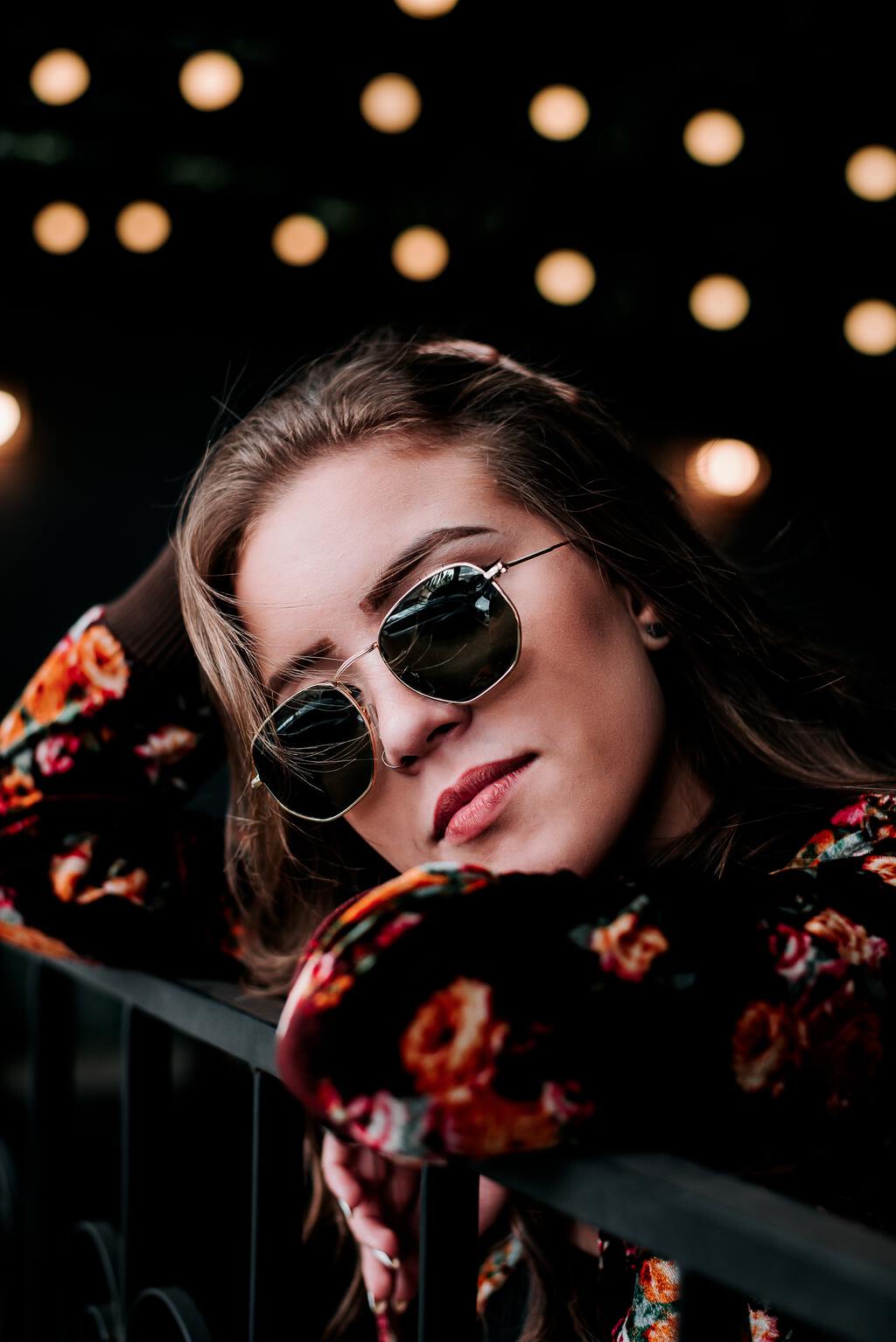 Girl with pink zebra striped sunglasses