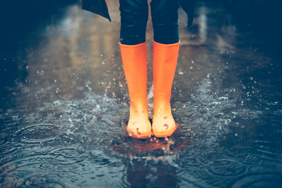 Orange rain boots