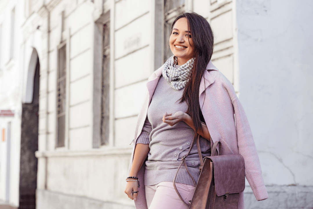 Woman in pastel coat