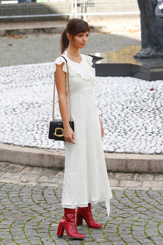 Emrata in a white dress at pfw