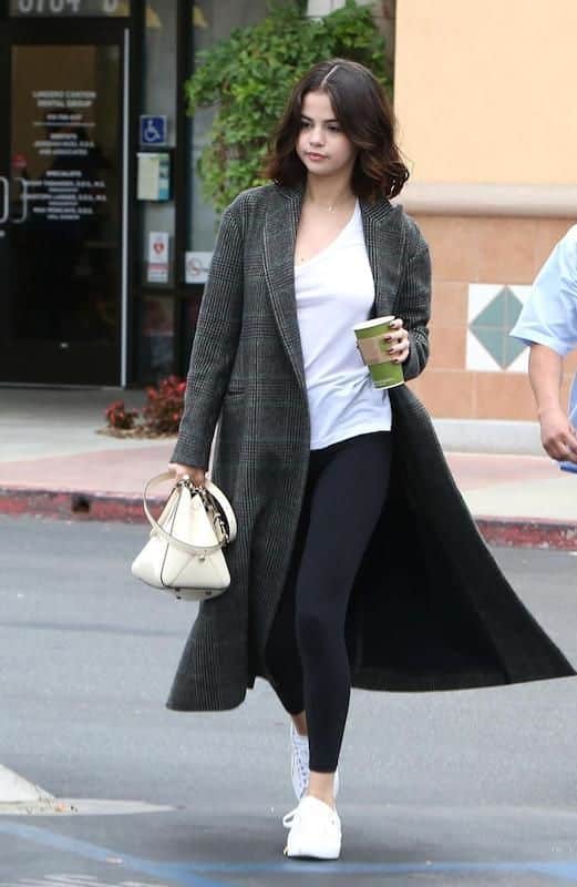 Selena gomez in a long coat