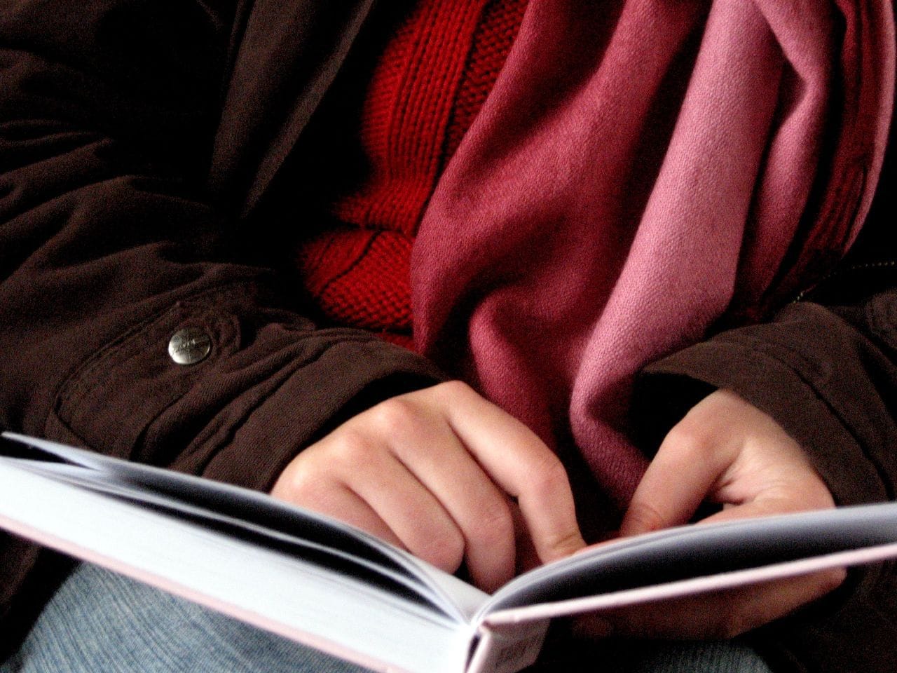 Girl holding book