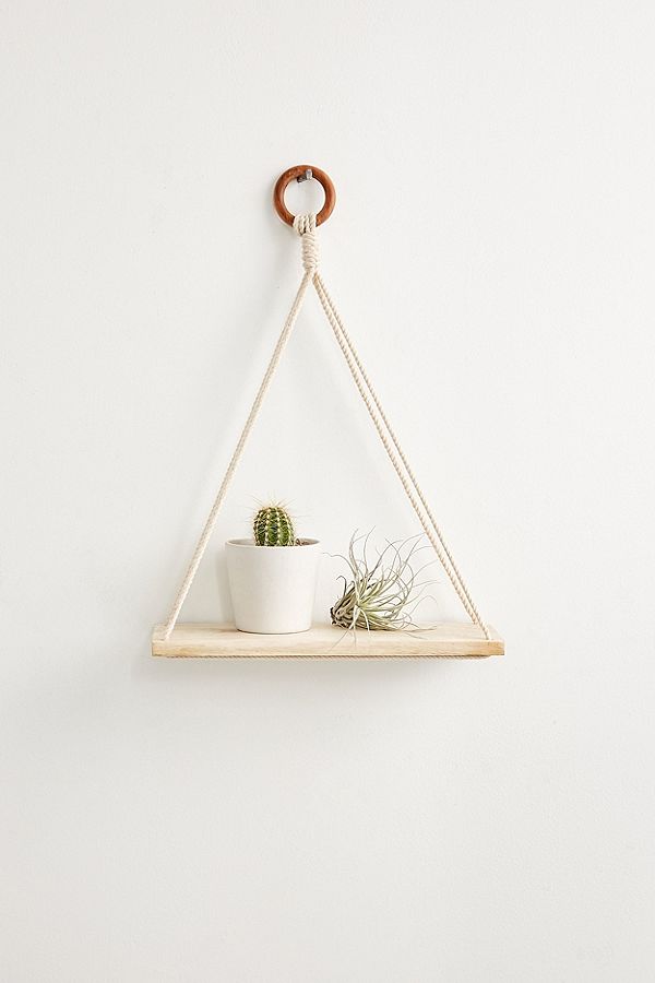 Macrame and wood simple wall shelf from Urban Outfitters.