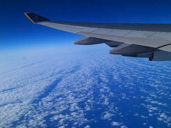 Airplane over water