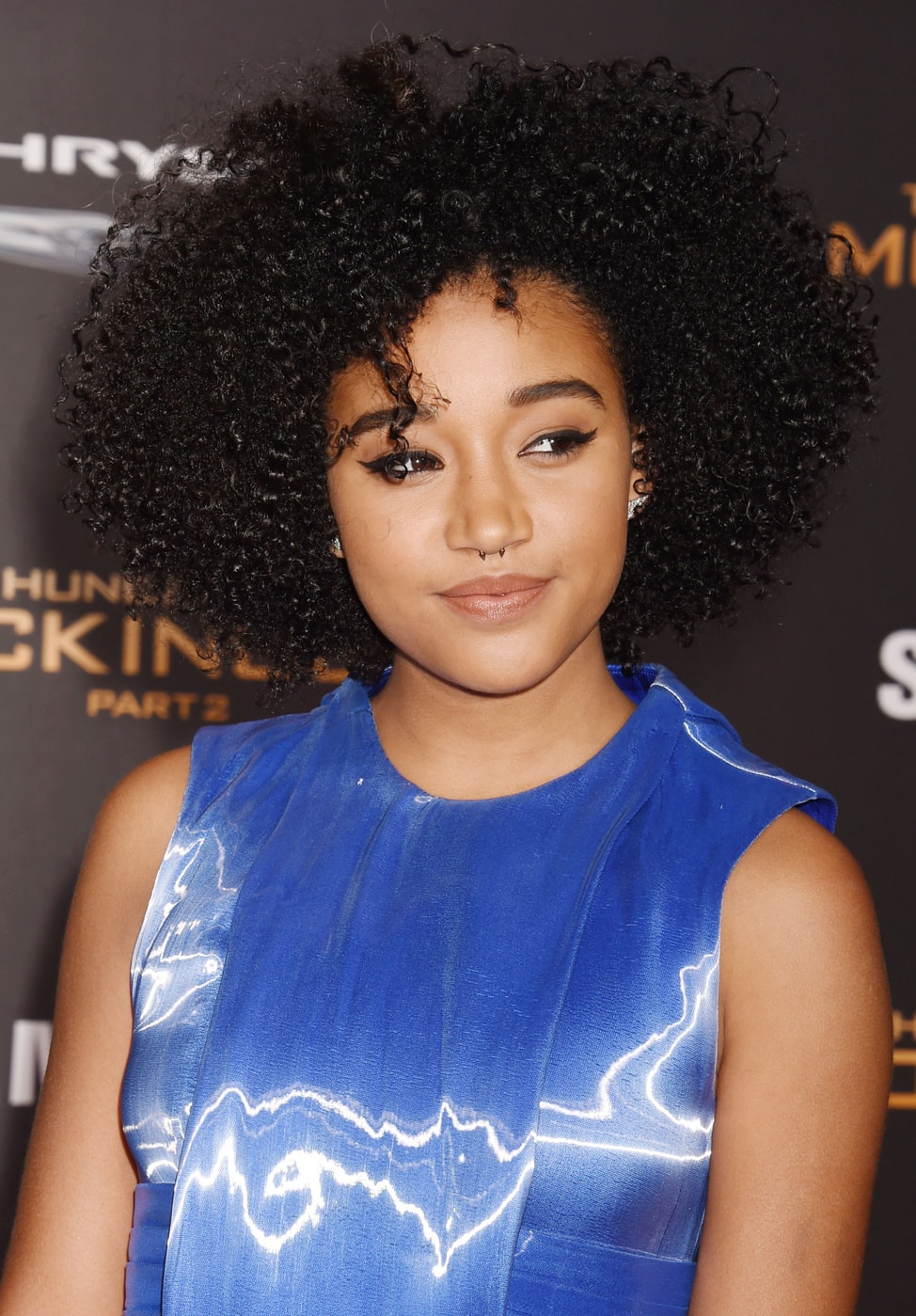 Amandla Stenberg at the premiere of The Hunger Games Mockingjay Part 2 in a blue dress