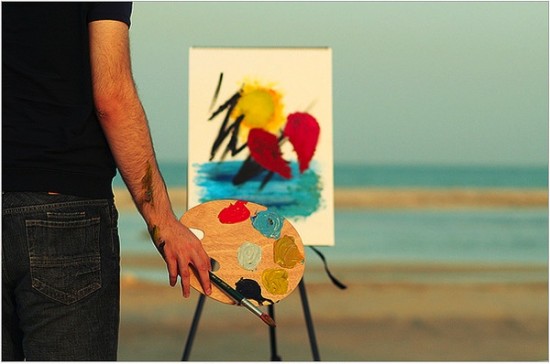 Artist, easel, and painting