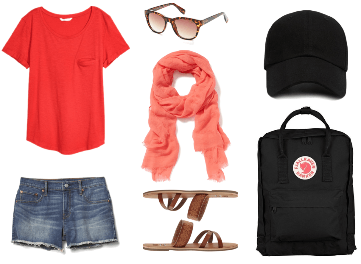 "Ask CF: What Should I Pack For My Job as a Camp Counsellor?" Outfit #4 featuring bright red u-neck t-shirt with left chest pocket and rounded hem, medium-wash denim cut-off shorts with frayed hem, brown tortoise wayfarer sunglasses with brown lenses, coral scarf with fringe, cognac-brown strappy sandals with decorative strap, black baseball cap, black backpack with red-and-white Fjallraven logo