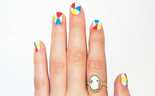 Summer nail art inspired by beach balls