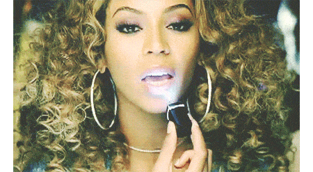 Beyonce applying lipstick gif