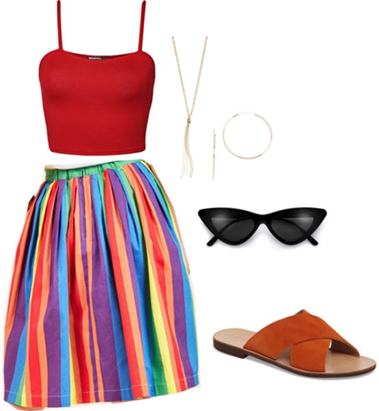 Billie Lourd birthday party outfit: Rainbow skirt paired with a red crop top and slide sandals. Accessories include a long tassel necklace, gold hoop earrings and black cat-eye sunglasses.