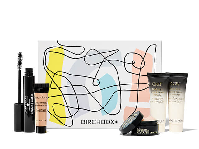 January Birchbox including: Mascara, Smashbox concealer, radiance cream, and Oribe cream.