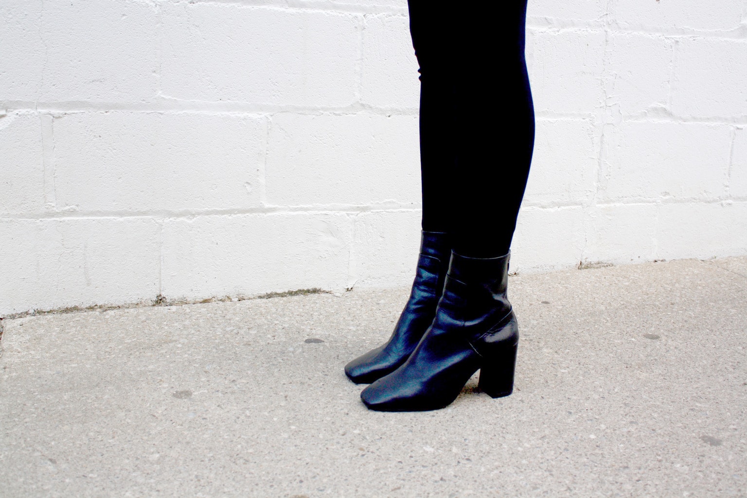 Black ankle booties on campus at Western University