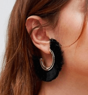 Photo of black fringe earrings.