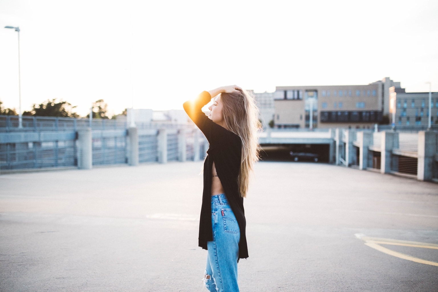 Woman wearing a black top in summer