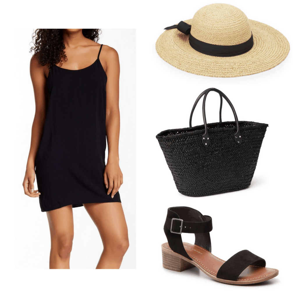 Black slip dress with black ribbon sun hat, black woven bag, and black sandals