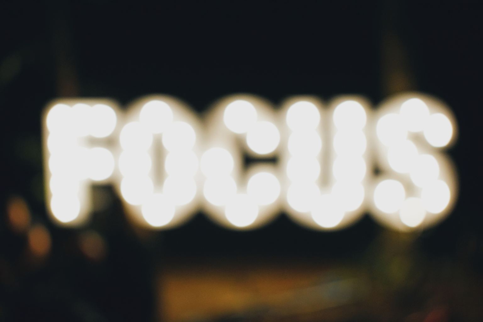 blurred lighting of the word focus