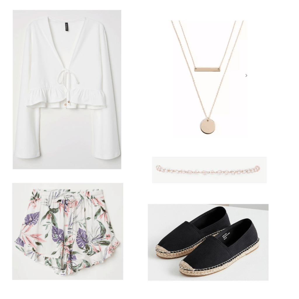 white crop top, floral shorts, gold necklace and bracelet, black shoes