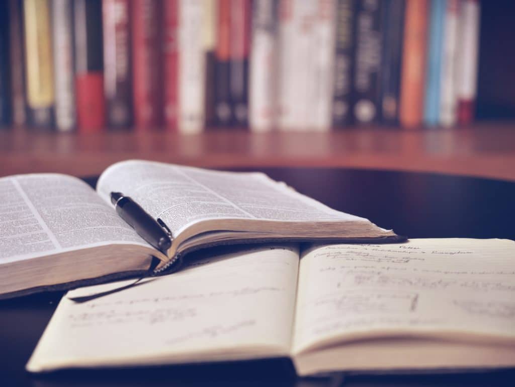 Books on the table at the library during finals week