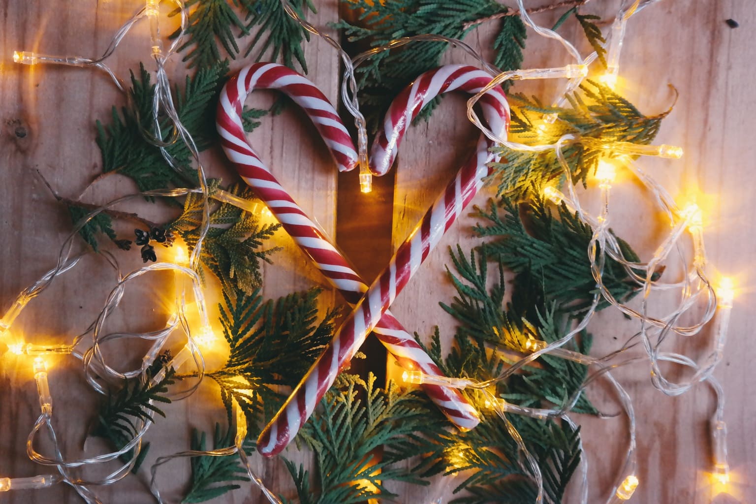 Two candy canes forming a heart as a Christmas decoration