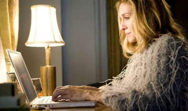 Carrie from Sex and the City at her computer