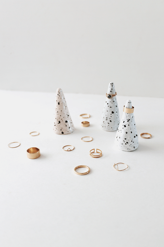 Photo with ceramic rings cones that are spotted with various rings all over.