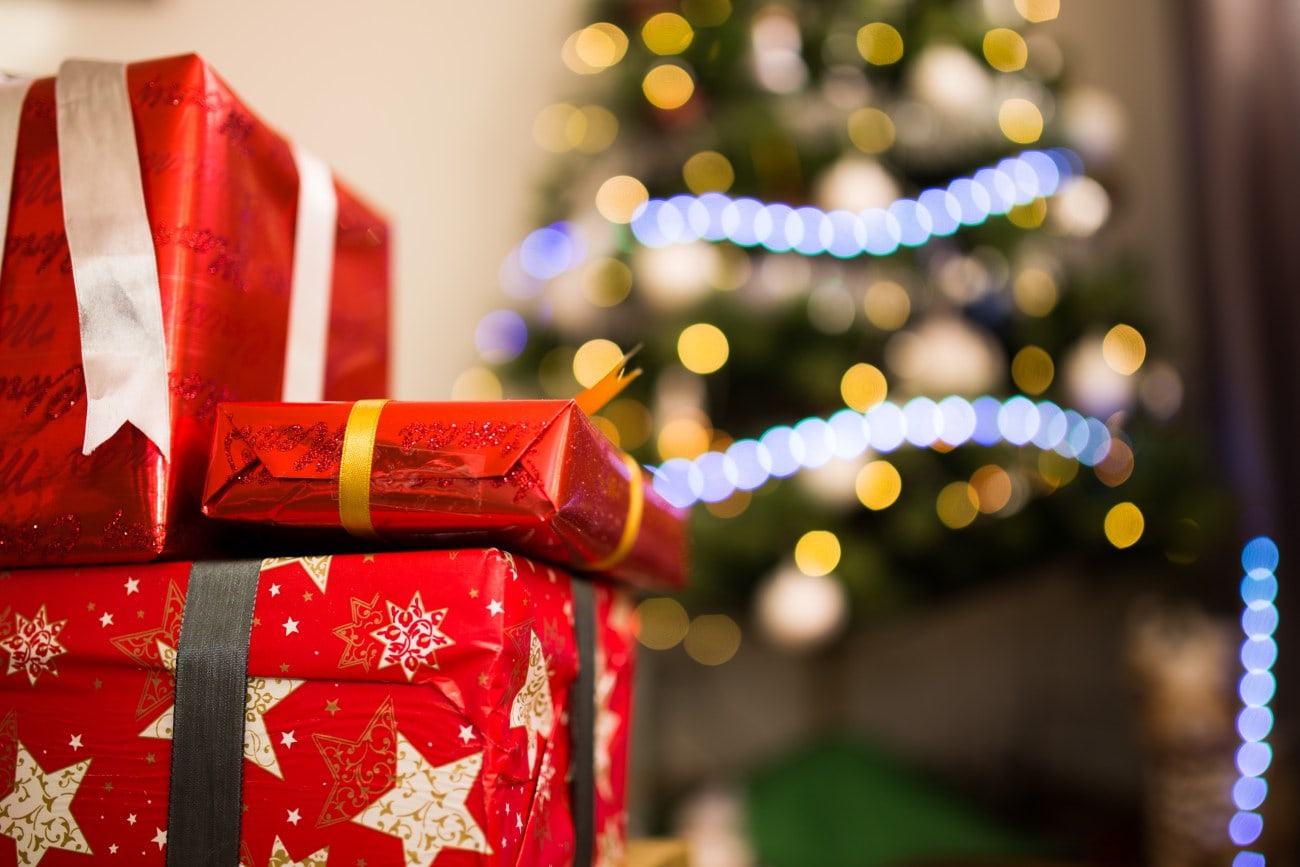 Christmas gifts with red and gold wrapping paper