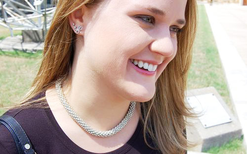College street style trend: statement necklace and classic earrings