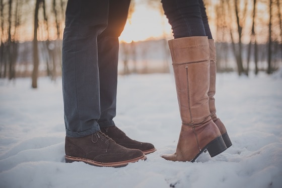 Couple in snow sunset