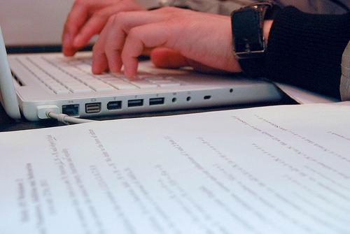 Writing a cover letter on a laptop