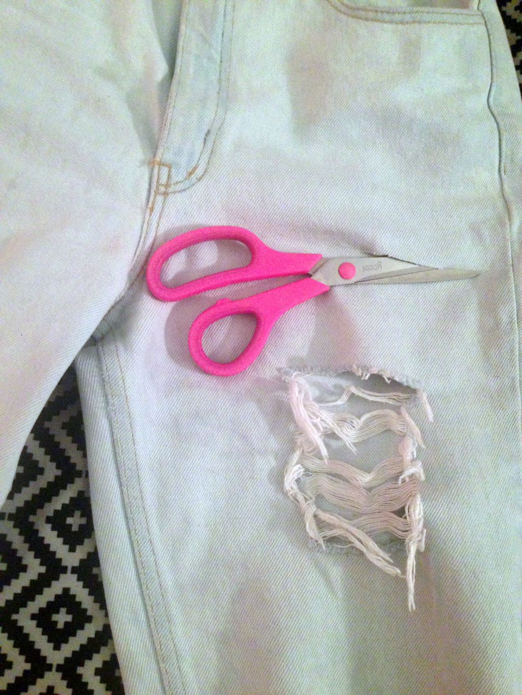 DIY distressed jeans scissors