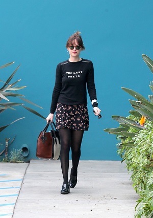 Dakota Johnson sweater and skirt outfit