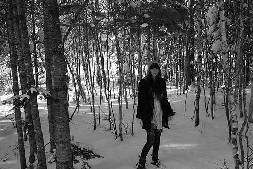 Girl wearing a dress in the snow