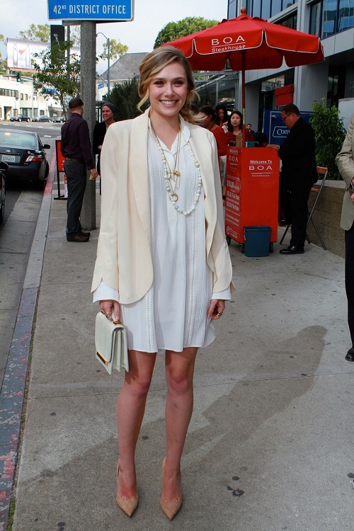 Elizabeth Olsen white shirtdress and cream blazer