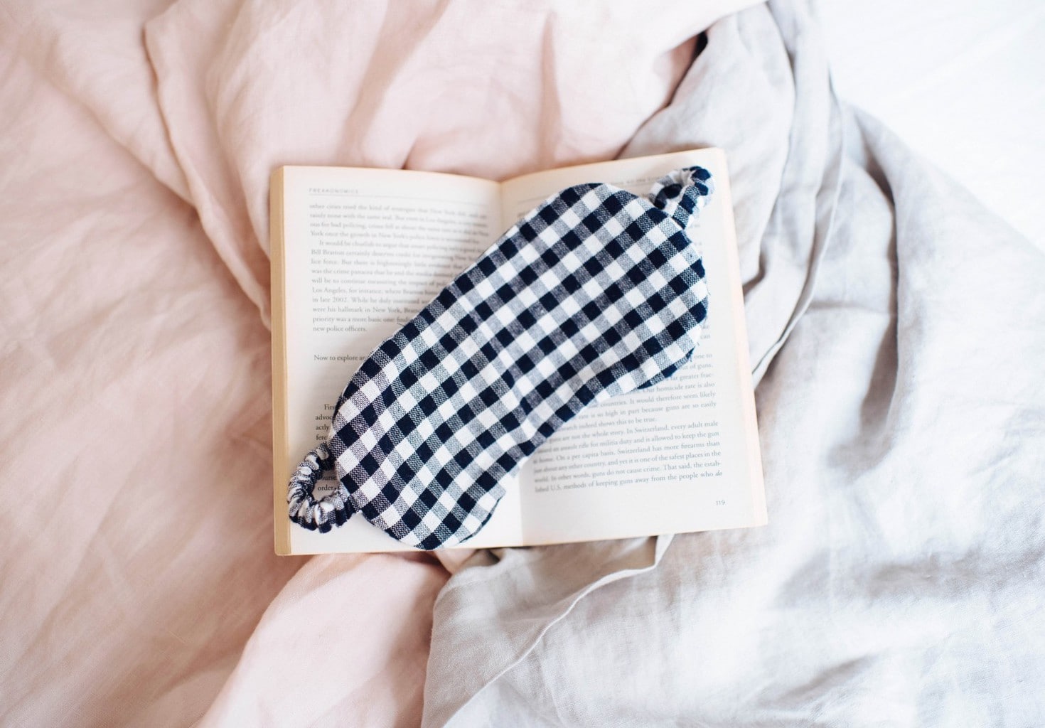 a notebook and sleeping mask - holiday gift ideas