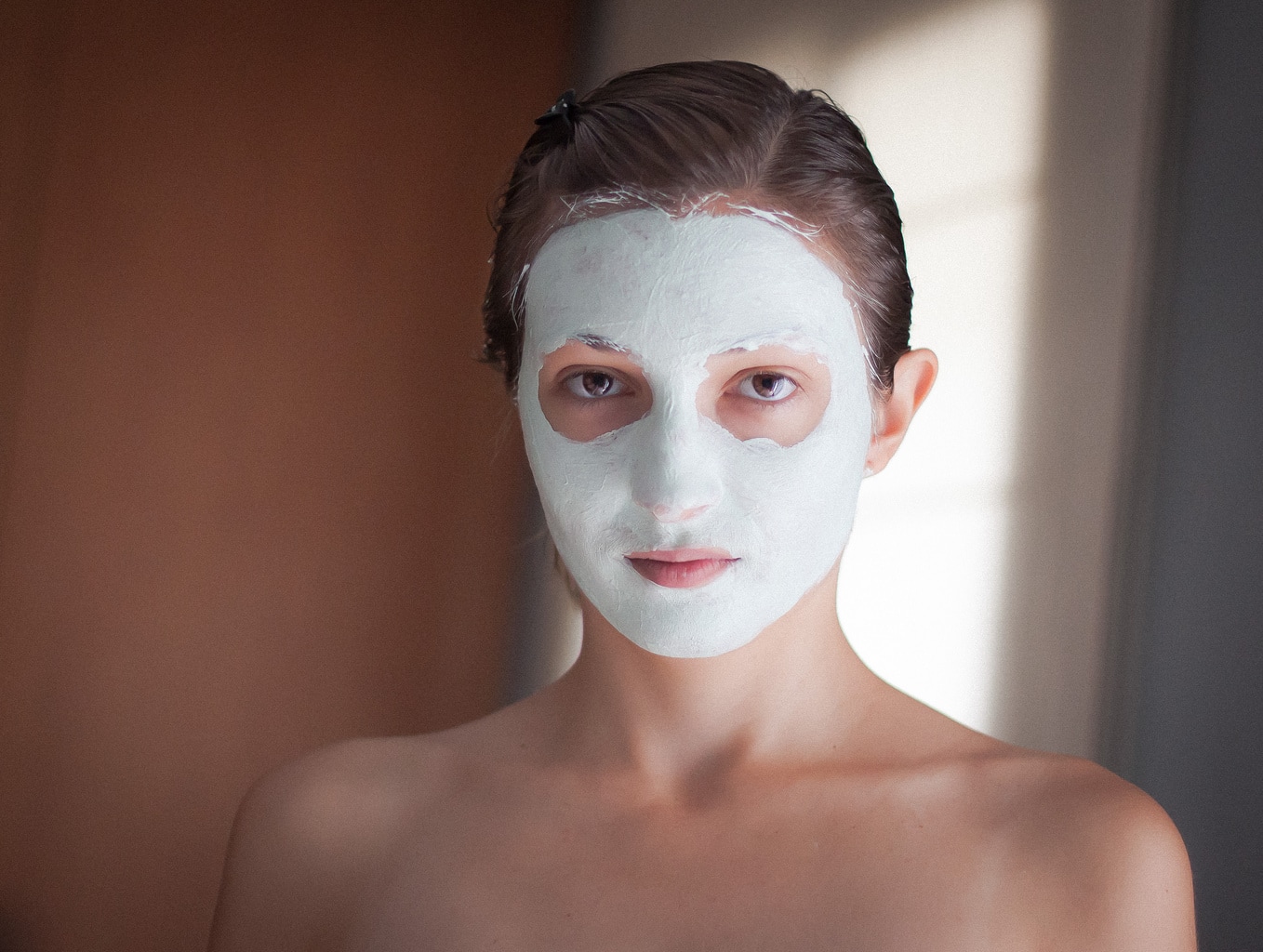 Woman doing a face mask