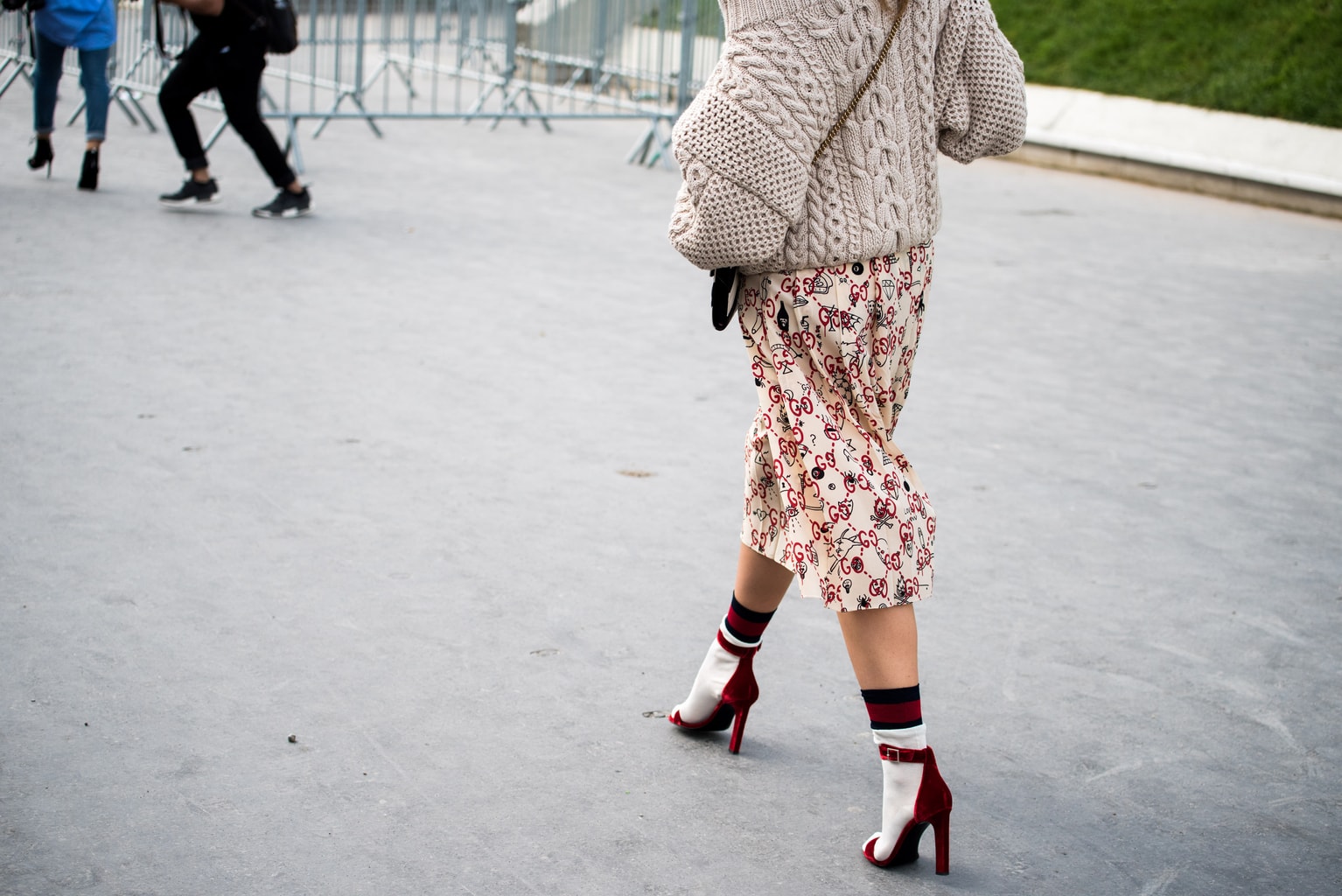 Fashionable woman wearing socks and heels