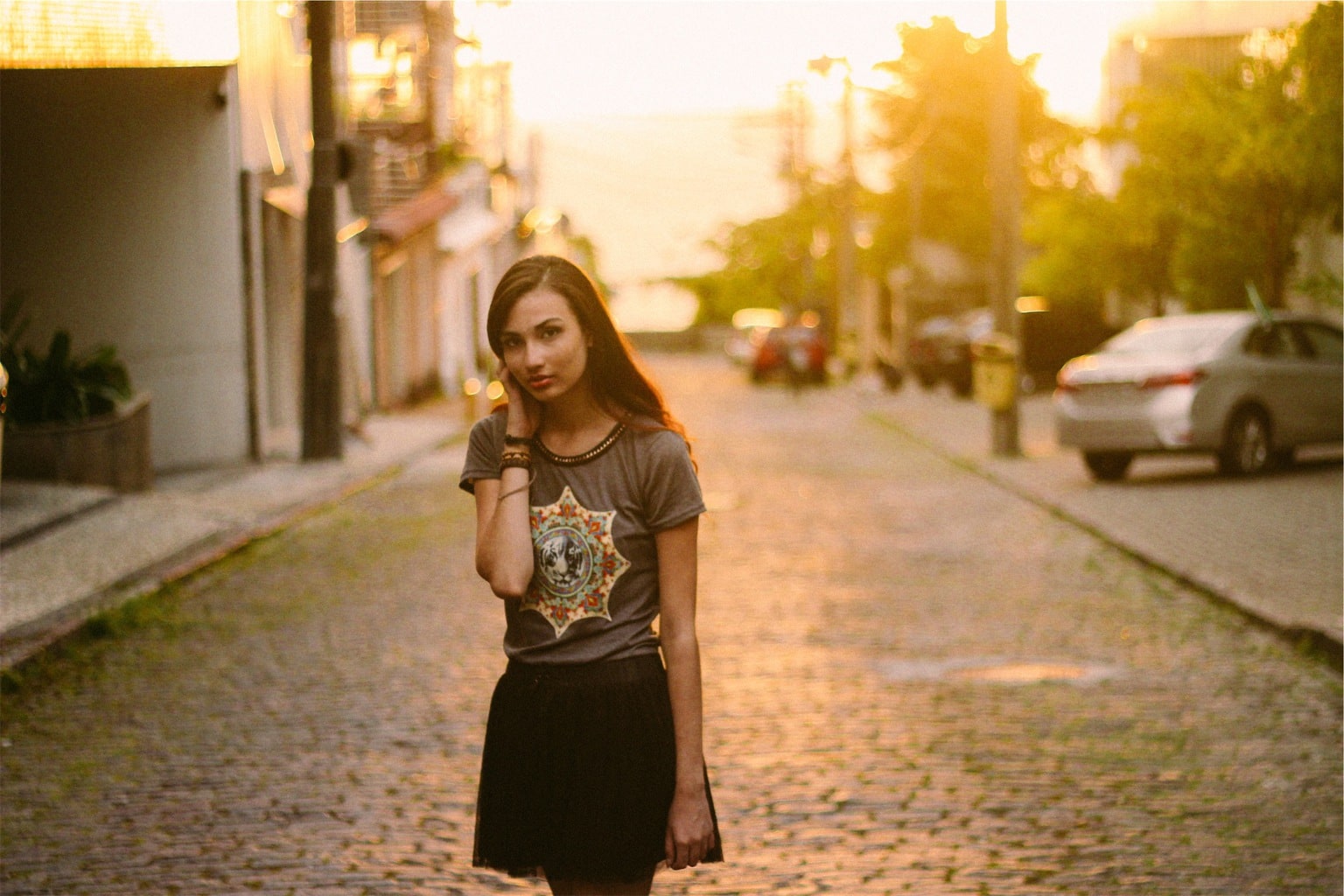 Girl wearing a skirt and tee