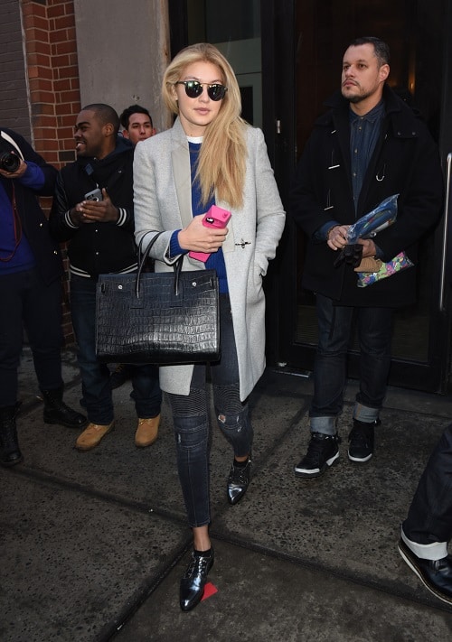 Gigi Hadid menswear-inspired coat and structured purse