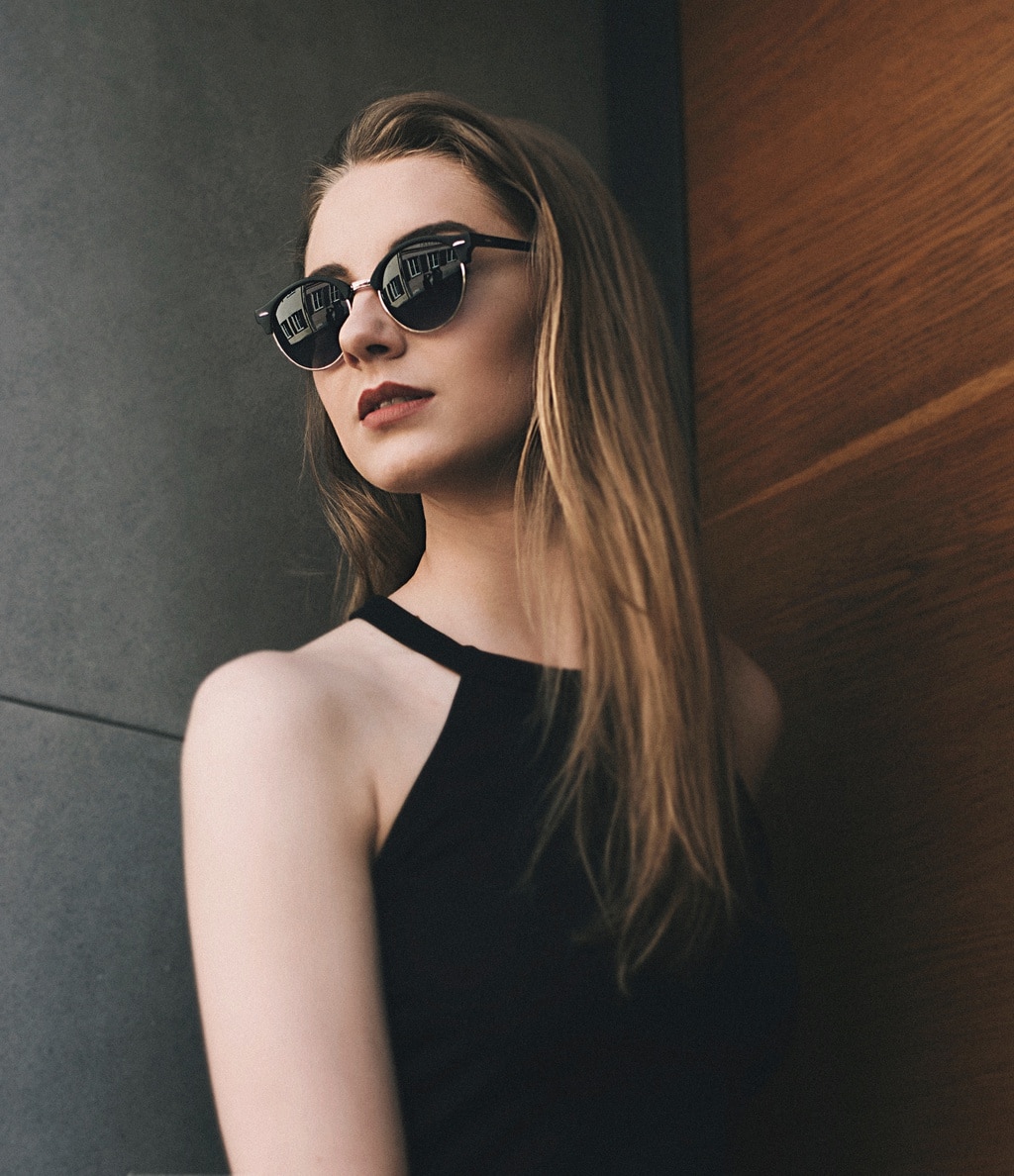 Girl hanging out wearing sunglasses
