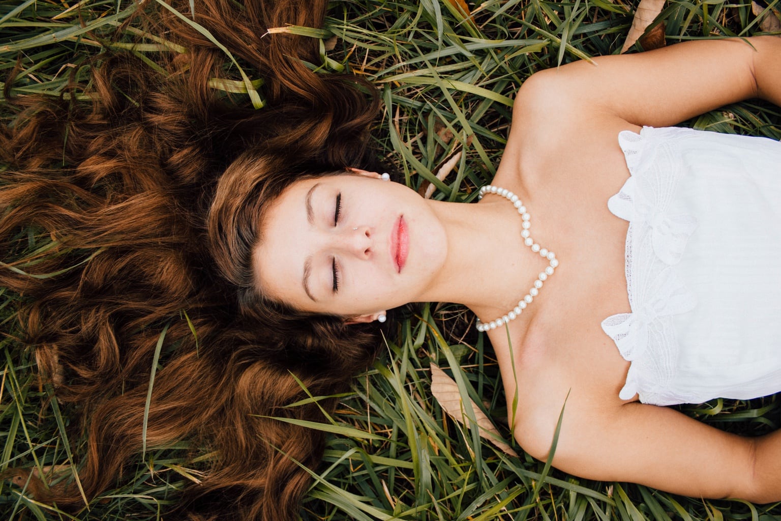 Girl lying in the grass