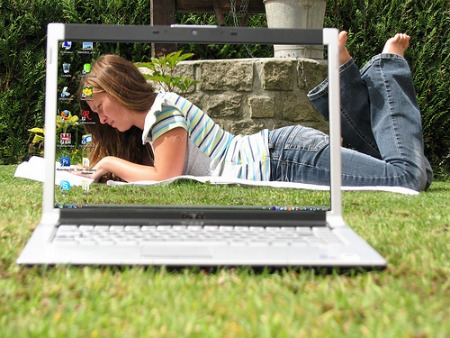 girl-laying-on-grass