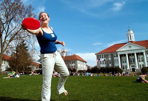 Girl playing frisbee