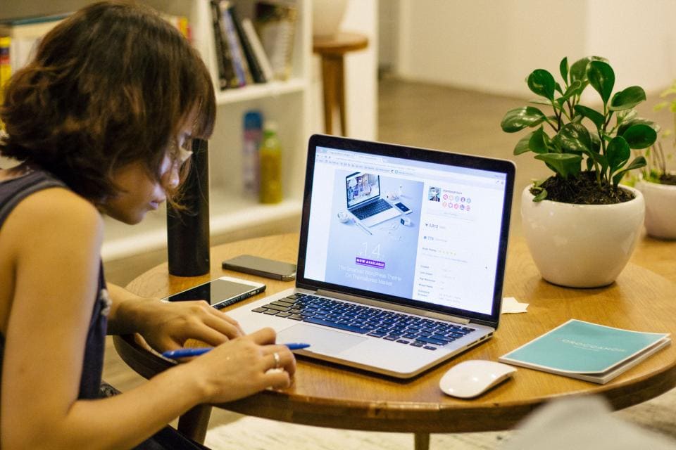 Girl on compter at desk