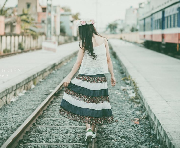 Girl walks through building