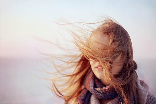 Girl wearing a patterned scarf