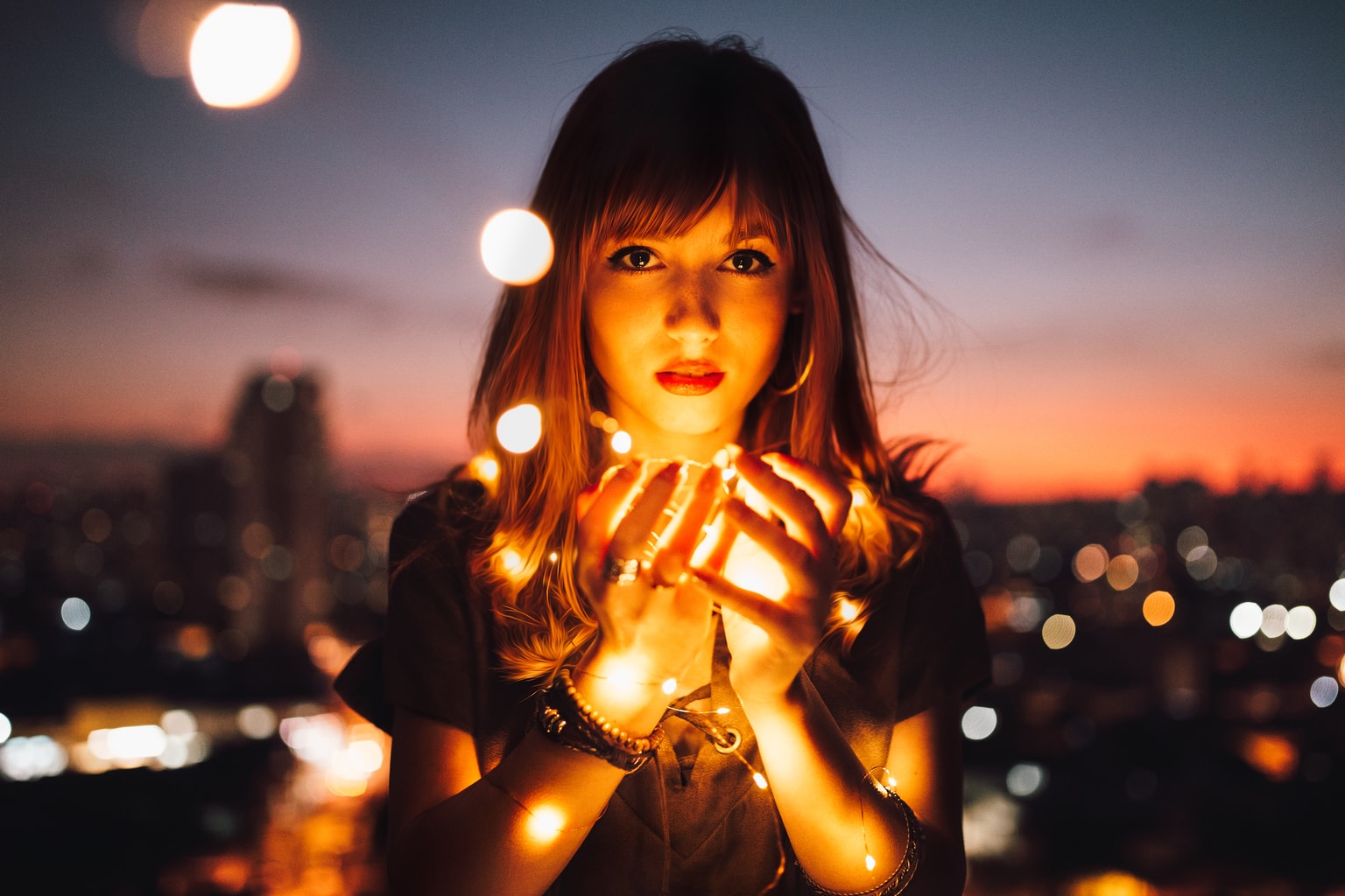 Girl holding lights