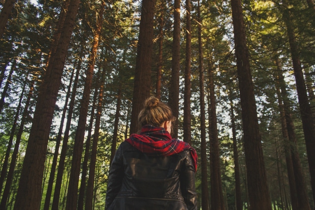 girl wearing plaid scarf