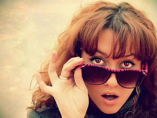 Girl with pink zebra striped sunglasses