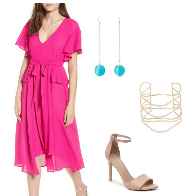 Graduation outfit idea: Bright pink dress with ruffles and cinched waist, gold bracelet, blue and gold drop earrings, nude sandals