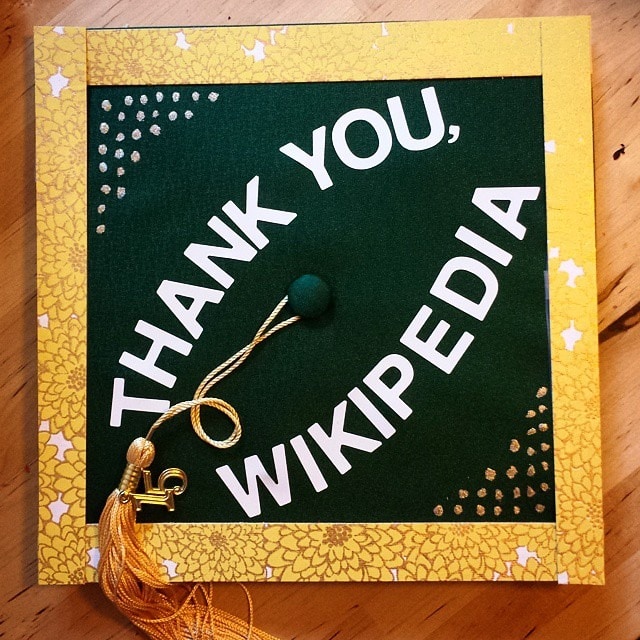 Decorated graduation cap that says 